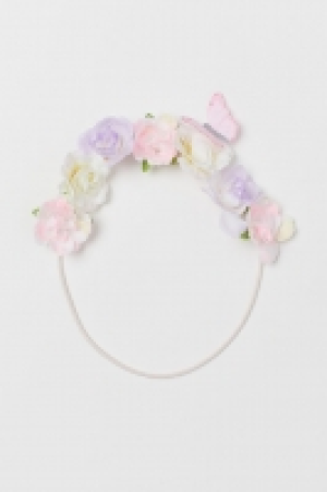 Cinta de pelo con flores 1.99 €