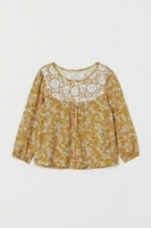 Blusa con canesú de encaje 5.99 €