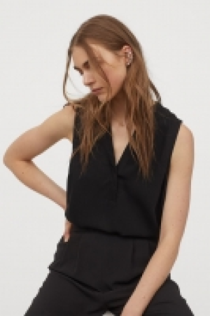 Blusa con escote de pico 14.99 €