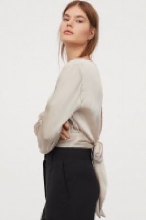 Blusa de anudar 12.99 €