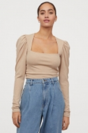 Top con mangas abullonadas 14.99 €