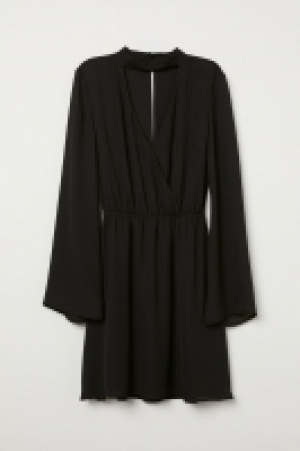 Vestido cruzado en V 15.99 €