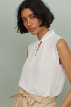 Blusa con cuello plisado 15.99 €