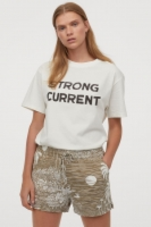 Pantalón corto en mezcla lino 9.99 €