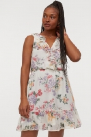 Vestido corto de volantes 21.99 €