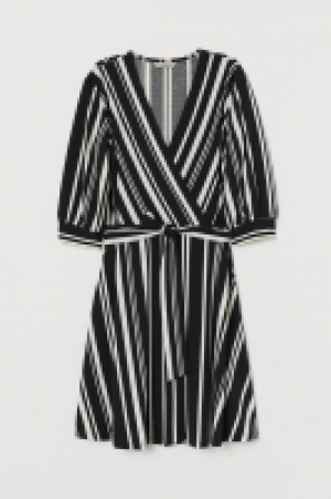Vestido de punto en V 10.99 €