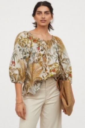Blusa con mangas puffy 8.99 €