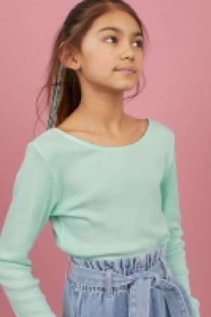 Camiseta en punto de canalé 2.99 €