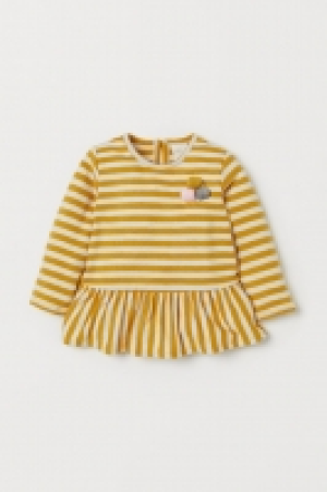 Camiseta con volante 3.99 €