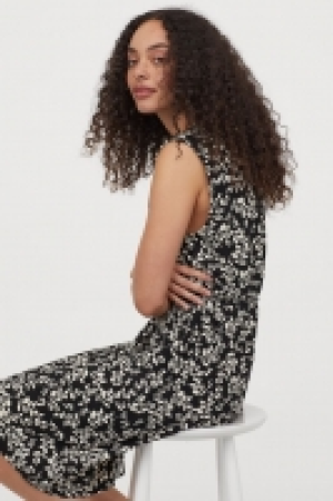 Vestido con tiras de anudar 6.99 €