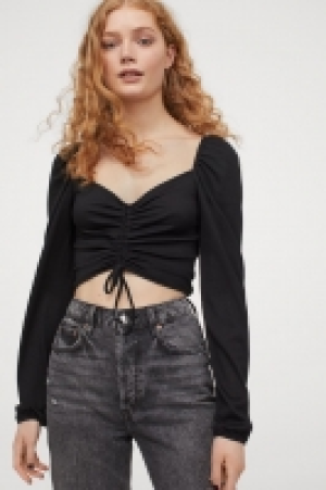 Top con cordón de ajuste 5.99 €