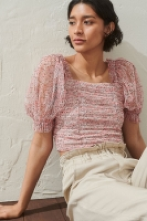 Top de malla con manga puffy 10.99 €