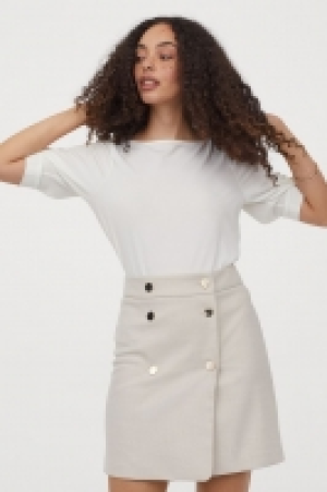 Falda de doble botonadura 17.99 €