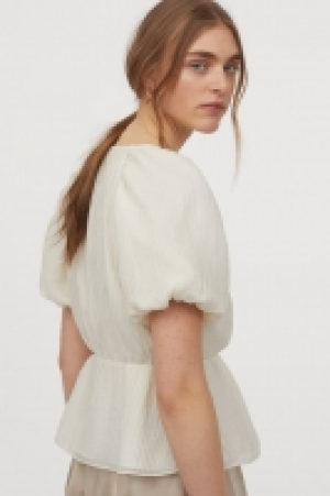Blusa cruzada con lyocell 12.99 €