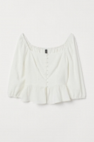 HM  Blusa con volante en el bajo