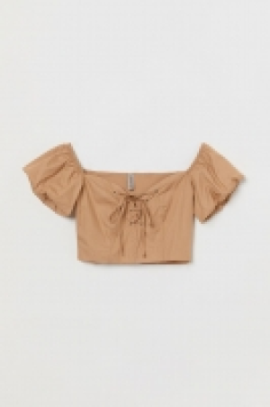 Blusa off-shoulder con lazada 13.99 €