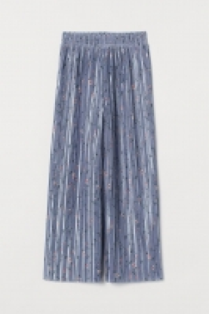 Pantalón plisado 13.99 €