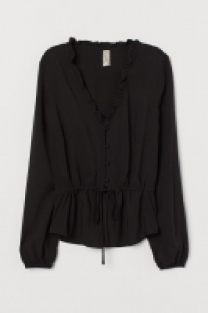 Blusa con peplo 13.99 €