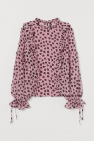 Blusa de gasa con volantes 14.99 €