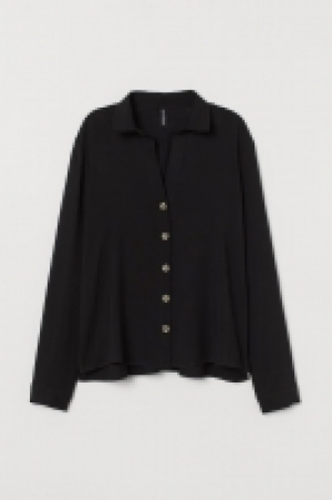 Camisa con escote en V 10.49 €