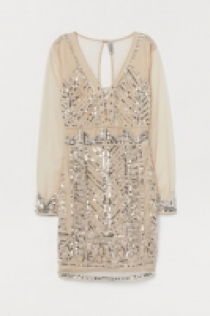 Vestido de malla y lentejuelas 27.99 €