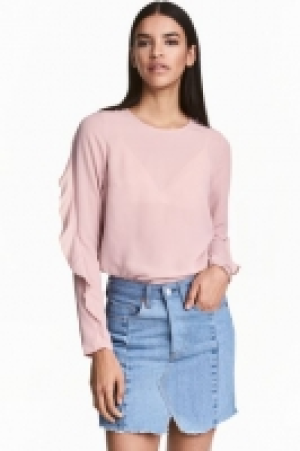 Blusa con volantes 13.99 €