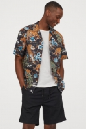 Pantalón corto en mezcla lino 13.99 €