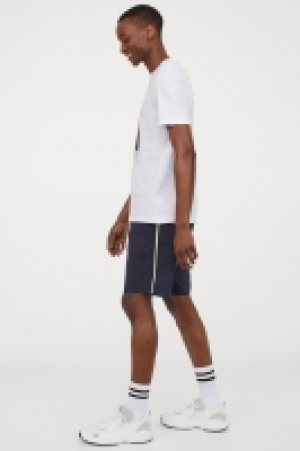 HM  Pantalón corto con franjas