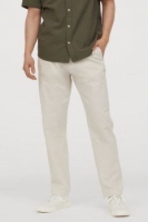 Joggers en cambray de algodón 13.99 €