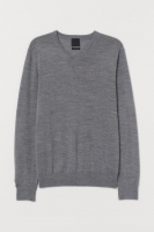 Jersey escote en V con lana 14.99 €