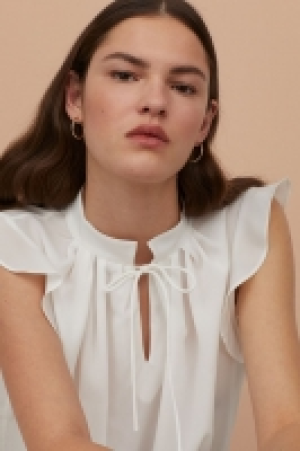 Blusa en crepé 12.99 €