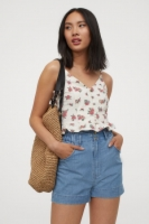 Top estampado con peplo 10.99 €