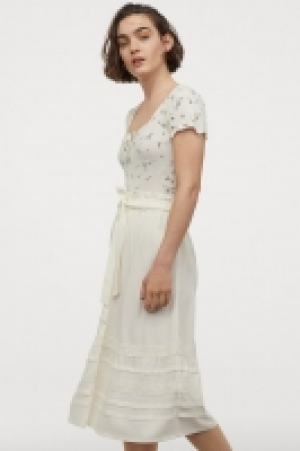 Falda midi con encaje 19.99 €