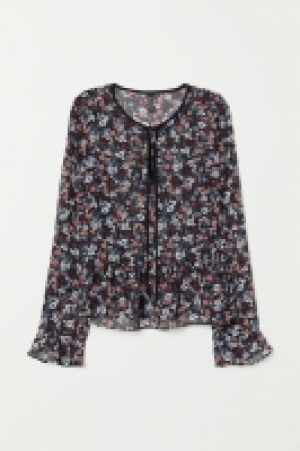 Blusa de gasa 11.99 €