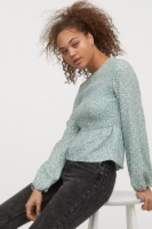 Top con peplo 11.99 €