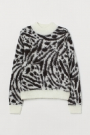 Jersey en punto jacquard 20.99 €