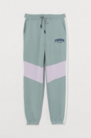 Joggers con franjas laterales 11.99 €