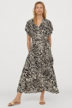 Vestido con botones 20.99 €