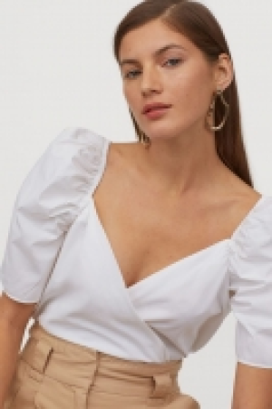 Blusa cruzada de popelina 6.99 €