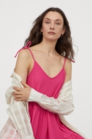 Vestido de punto escote en V 7.99 €