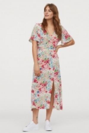 Vestido con mangas mariposa 24.99 €