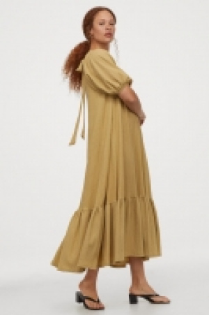 Vestido amplio con lazada 14.99 €