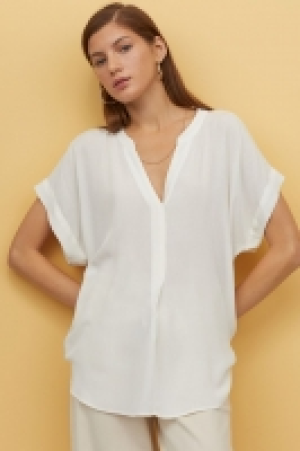 Blusa con efecto arrugado 6.99 €
