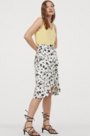 Falda cruzada con volantes 11.99 €