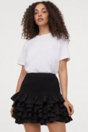 Falda de algodón con volantes 12.99 €