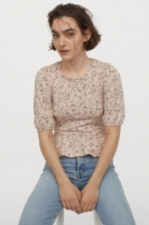 Top con peplo 8.99 €