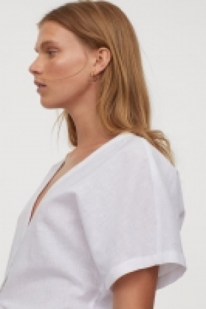 Blusa con lino y bajo anudado 8.99 €