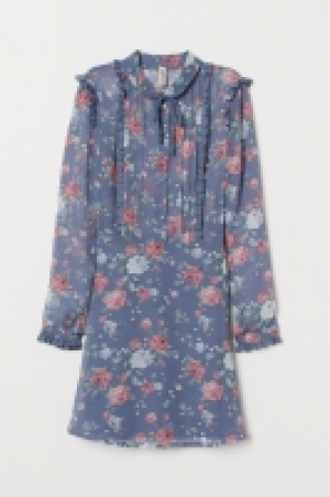 Vestido de gasa con volantes 17.99 €