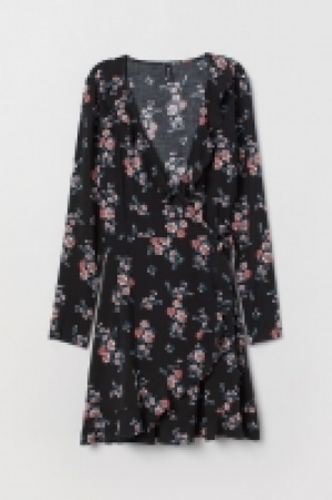 Vestido cruzado con volantes 13.99 €