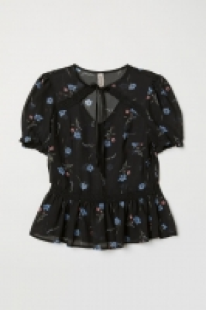 Blusa con mangas abullonadas 17.99 €